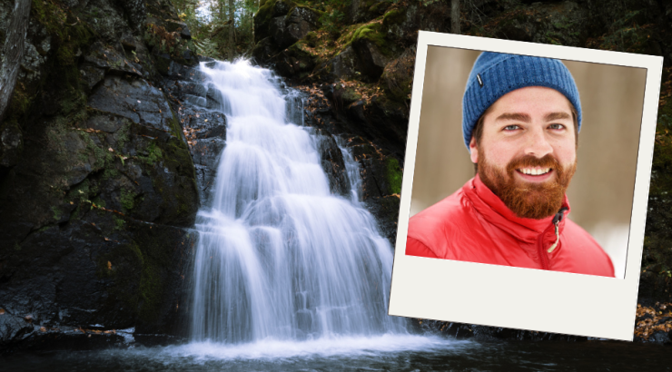 Nate Ptacek photo in front of waterfall 
