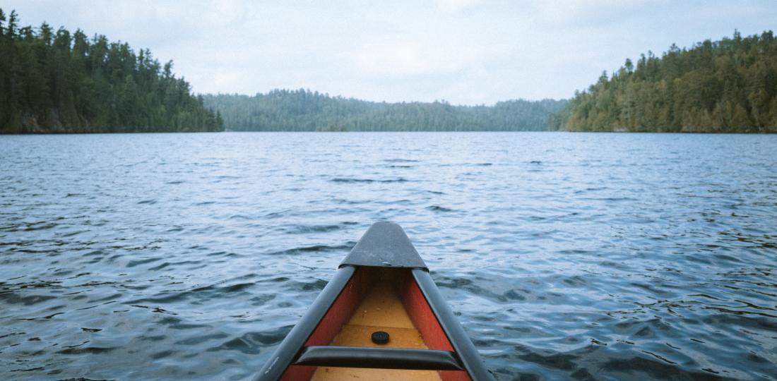 Canoe bow in the middle of lake 