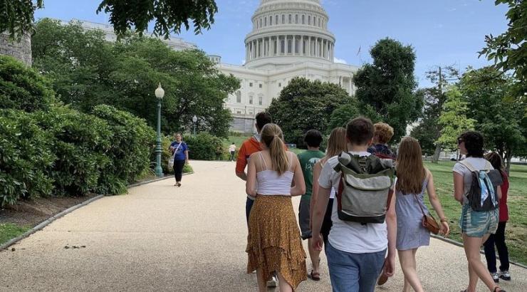 Photo of group of kids walking towards US Capitol building 