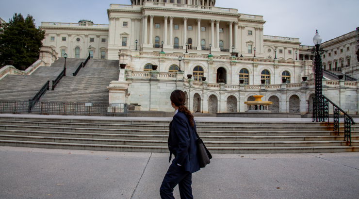 Photo of Joesph Goldstein walking infront of capitol building in DC