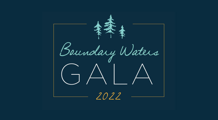 A navy blue graphic that says "Boundary Waters Gala 2022" surrounded by teal-colored pine trees