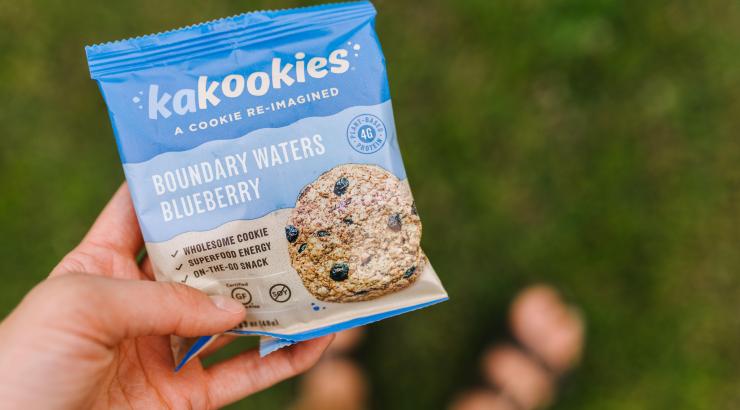 Image of person holding Kakookies Boundary Waters Blueberry bar