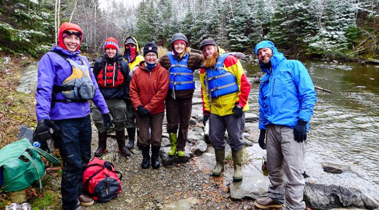 Group of 5 people standing with Amy and Dave Freeman during resupply