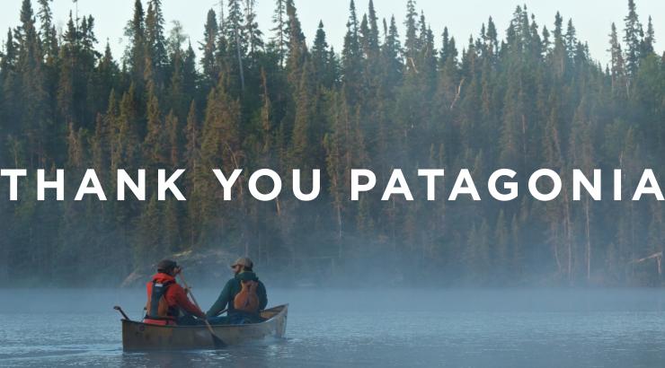 two people paddling a canoe and the text above reading Thank You Patagonia