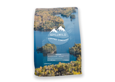 Photo of Idyllwild bag of coffee with image of the boundary waters overlaid. 