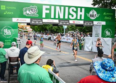 Runner crossing finish line 