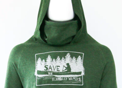 Green facecover hoodie with image of a person in a canoe on the water with trees in the background