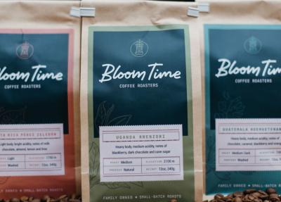 3 bags of different roasts of Bloom Time Coffee