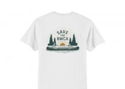 White t-shirt with cartoon drawing of trees, a canoe, and green text that says "Save the BWCA"
