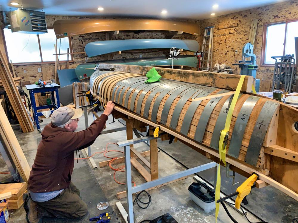 Steam bending and installing cedar ribs over a solid form