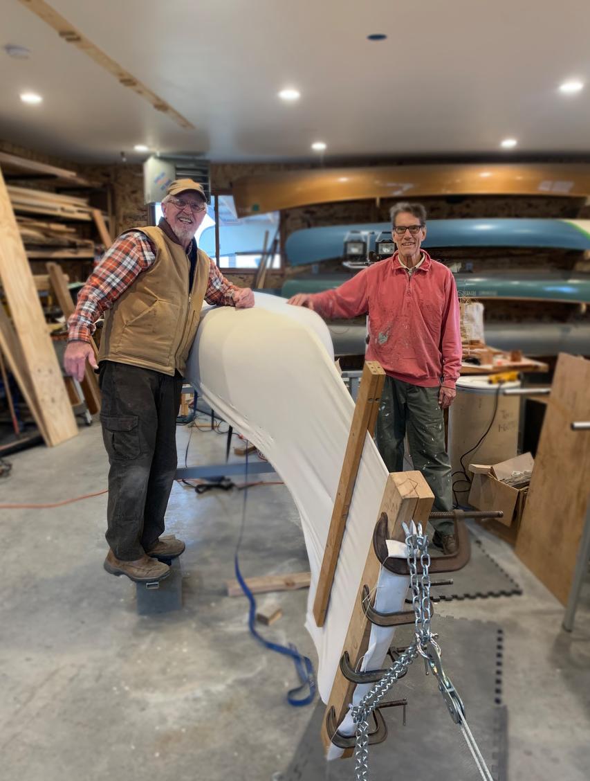 Stretching cotton canvas tightly over the planked hull