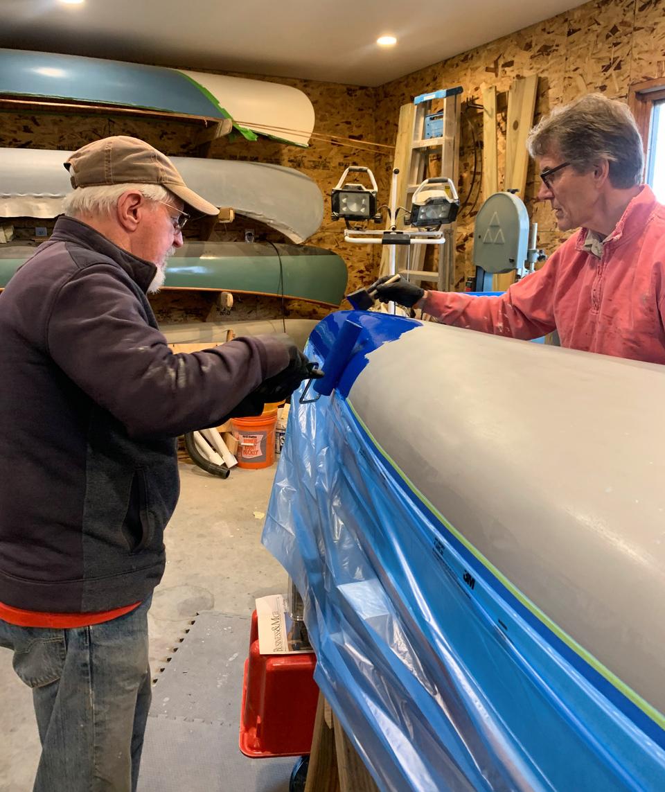 Filling and painting the canvas exterior in marine enamel blues