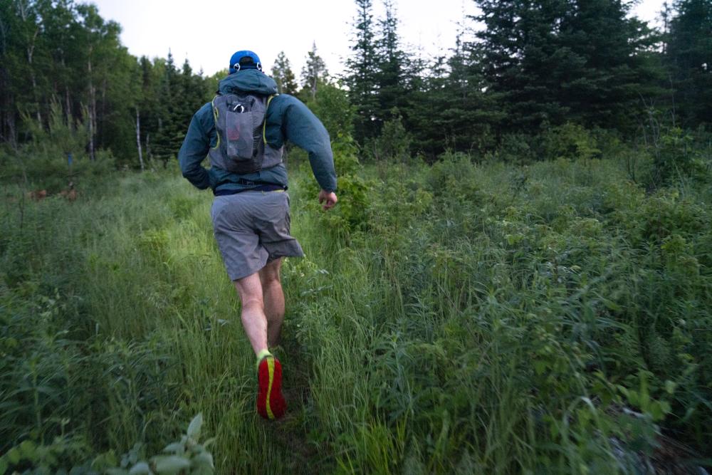 Alex Falconer, Director of Government Relations for Save the Boundary Waters, runs along a trail during his traversal of the Boundary Waters. 