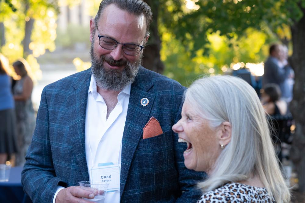 Attendees laughing
