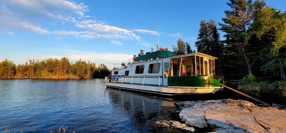 Houseboat moored in Voyageurs. [o] Chris Herman