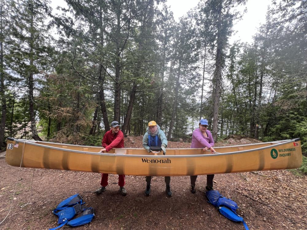 Flipping the canoe. Photo: Tyler