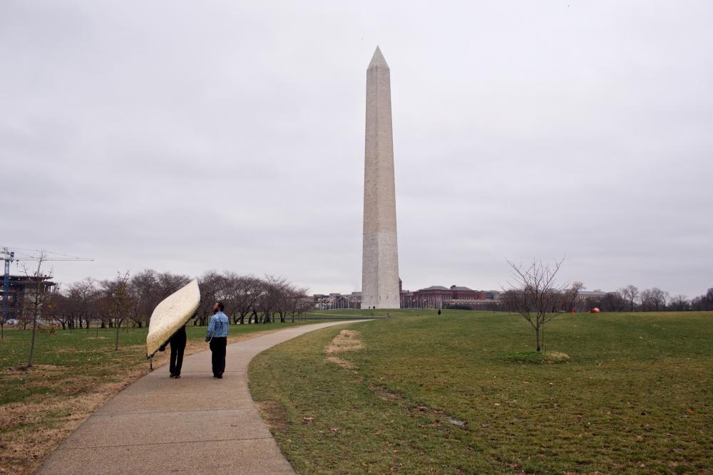 The Freemans, seen here portaging their canoe in front of the Washington Monument, undertook the 2,000-mile trip to raise awareness about the dangers of proposed sulfide-ore copper mining to the BWCAW.