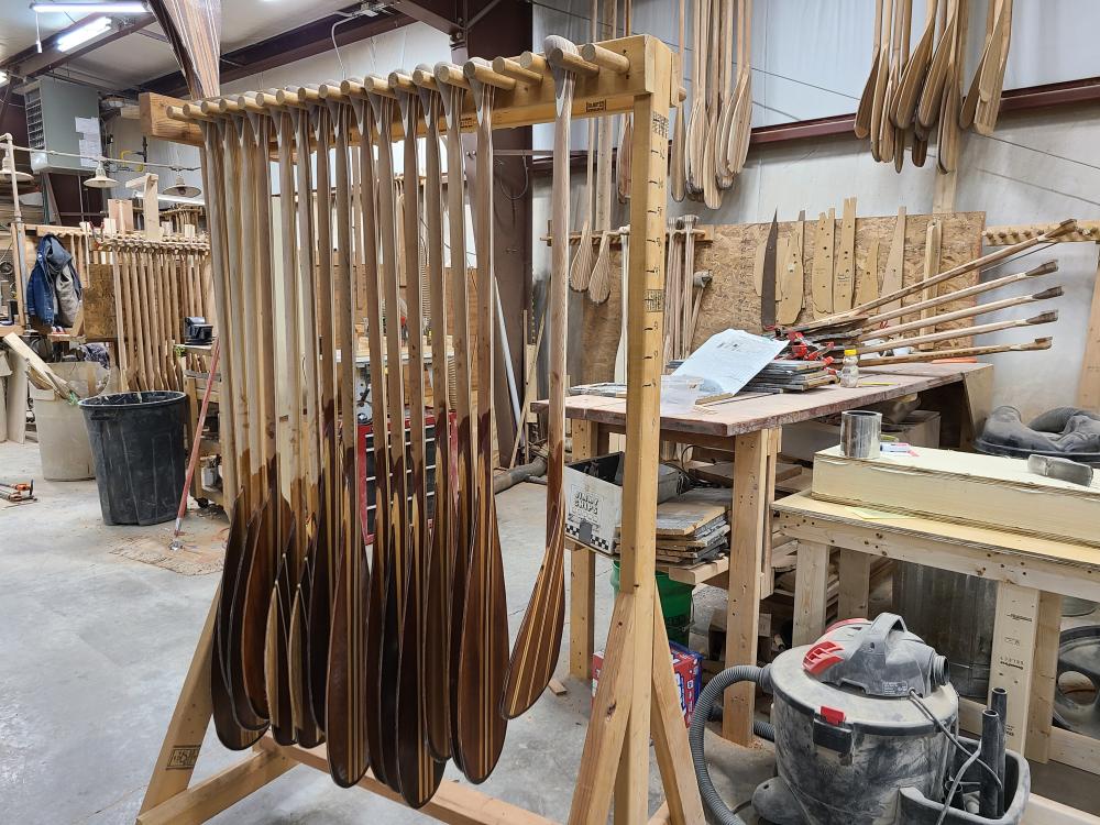 An image of Sanborn paddles on a rack