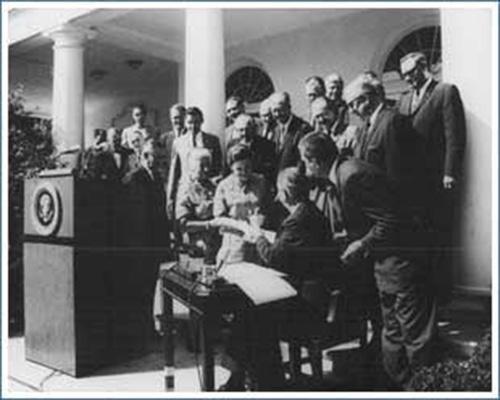 President Lyndon B. Johnson signs the 1964 Wilderness Act. Photo credit: https://commons.wikimedia.org/w/index.php?curid=1619785