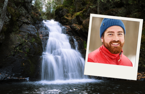 Nate Ptacek photo in front of waterfall 