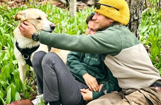 Ben Seaton, his partner and dog enjoying spring weather.