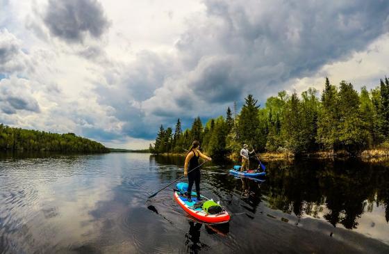 Photo of 2 people on a stand up paddle boards in Boundary Waters