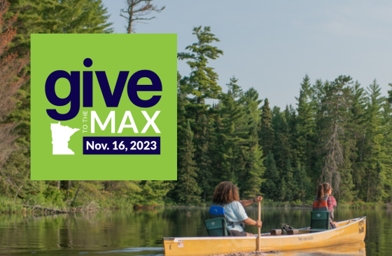 two people canoeing