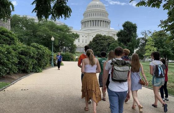 Photo of group of kids walking towards US Capitol building 