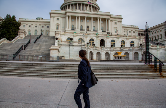 Photo of Joesph Goldstein walking infront of capitol building in DC