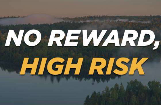 Picture of the Boundary Waters with the text "No Reward, High Risk," overlaid, representing the threat of sulfide-ore copper mining to the area