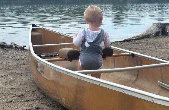 one year old in canoe