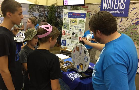 Save the Boundary Waters volunteer spinning prize wheel for 2 people