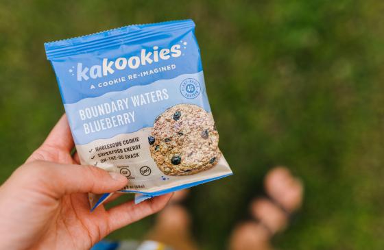 Image of person holding Kakookies Boundary Waters Blueberry bar