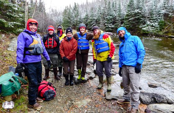 Group of 5 people standing with Amy and Dave Freeman during resupply