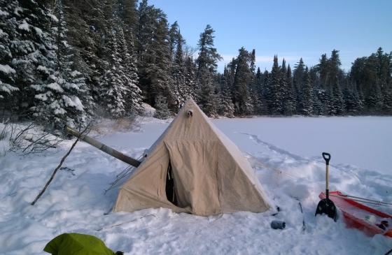 Photo canvas tent on frozen lake in Boundary Waters